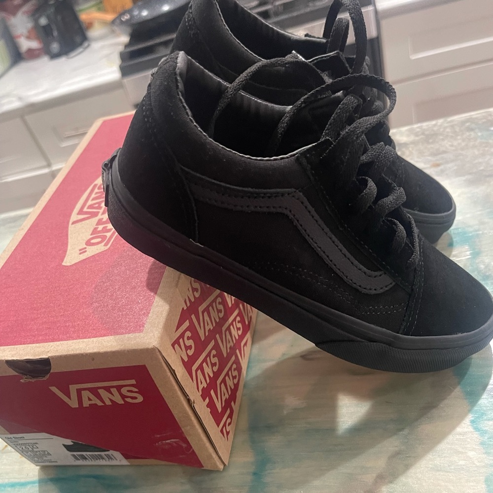 Black suede Vans. Brand New. Size 2US.
